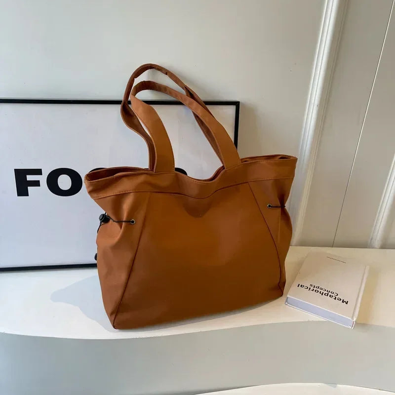 Upgrade your everyday style with the Urban Chic Large Capacity Tote Bag. Designed for modern women who need both fashion and functionality, this spacious shoulder bag is perfect for work, travel, shopping, school, and daily use.